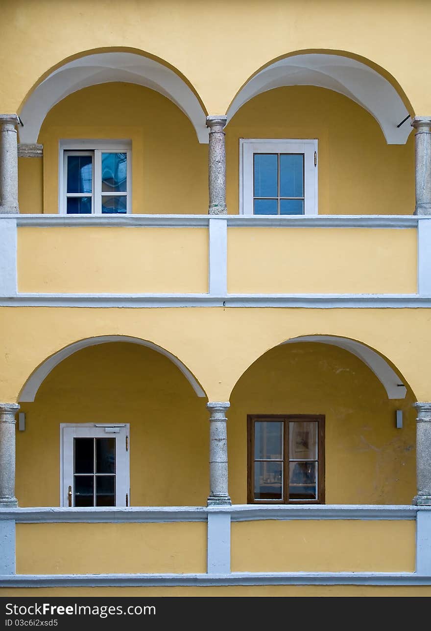 Arcade of a yellow baroque House, taken in Austria
