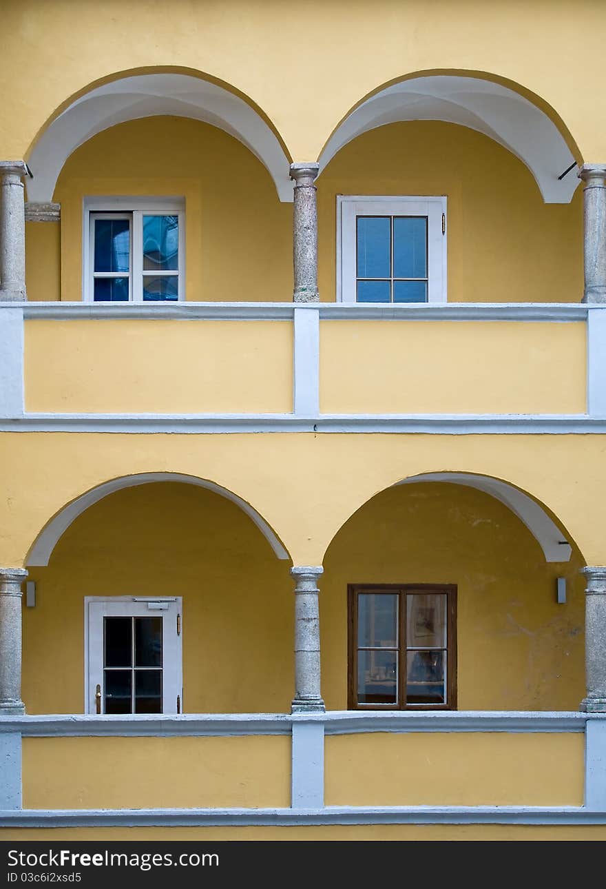 Arcade of a yellow baroque House