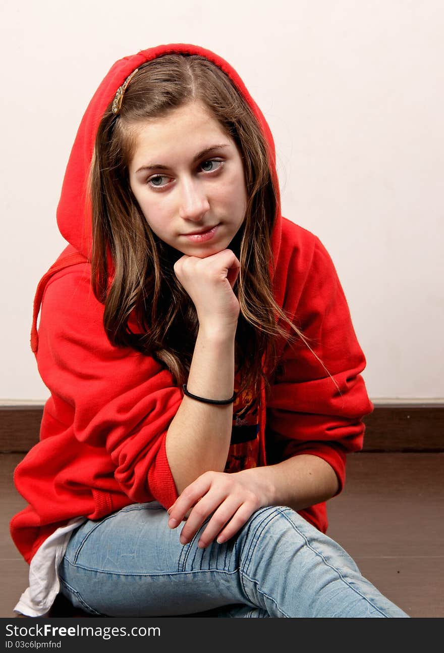 A teen girl in the red