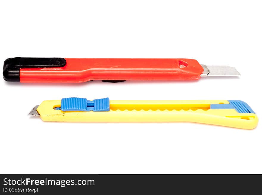 Two box cutters isolated on a white background