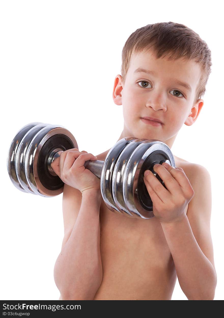 Little Boy Holds  Heavy Dumbbell