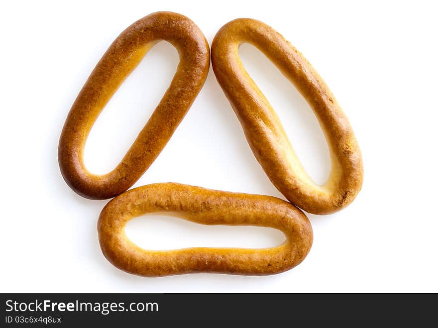 Meal theme. Nice bagels on a white background, look like appetizing. Meal theme. Nice bagels on a white background, look like appetizing.