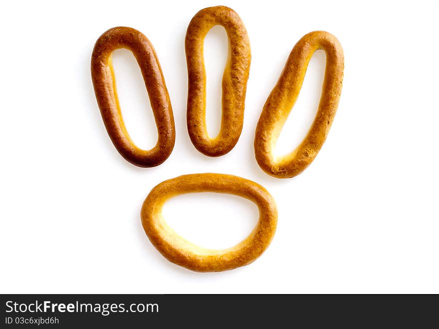 Meal theme. Nice bagels on a white background, look like appetizing. Meal theme. Nice bagels on a white background, look like appetizing.