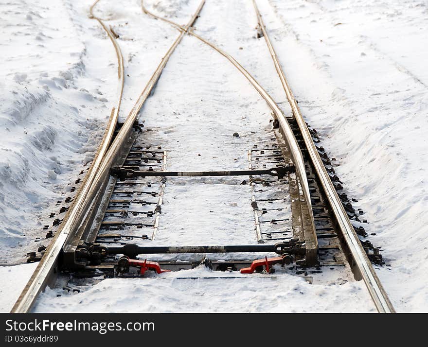 Multiple railroad tracks at a train station. Multiple railroad tracks at a train station