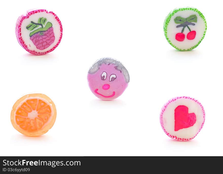 Five fruit candy on pink background. Five fruit candy on pink background.