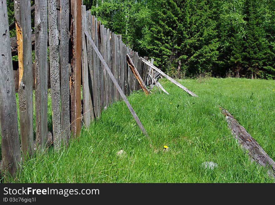 Wood proped up fence