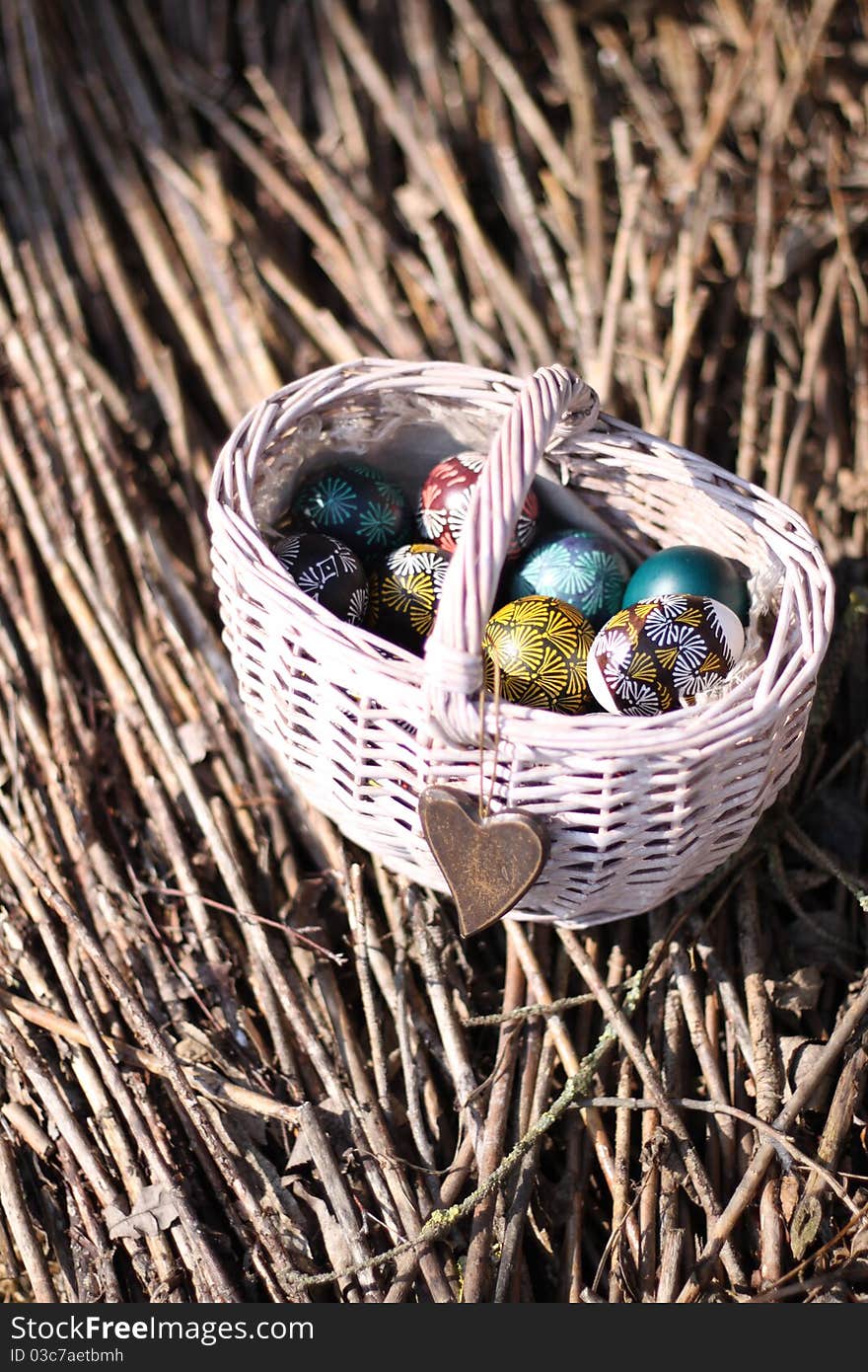 Easter eggs in white basket