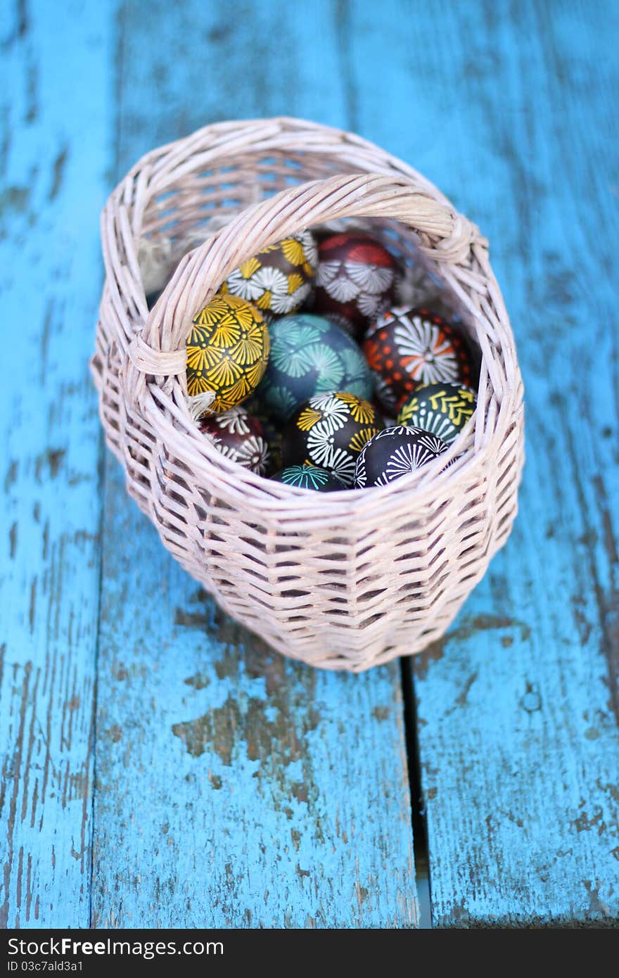 Easter eggs in white basket