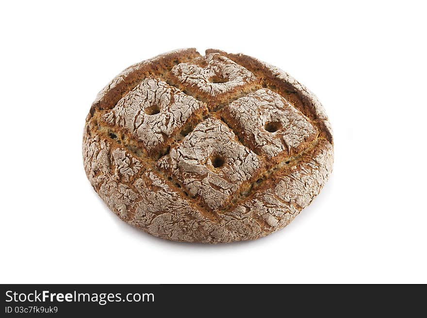 Useful grain wheat bread on a white background