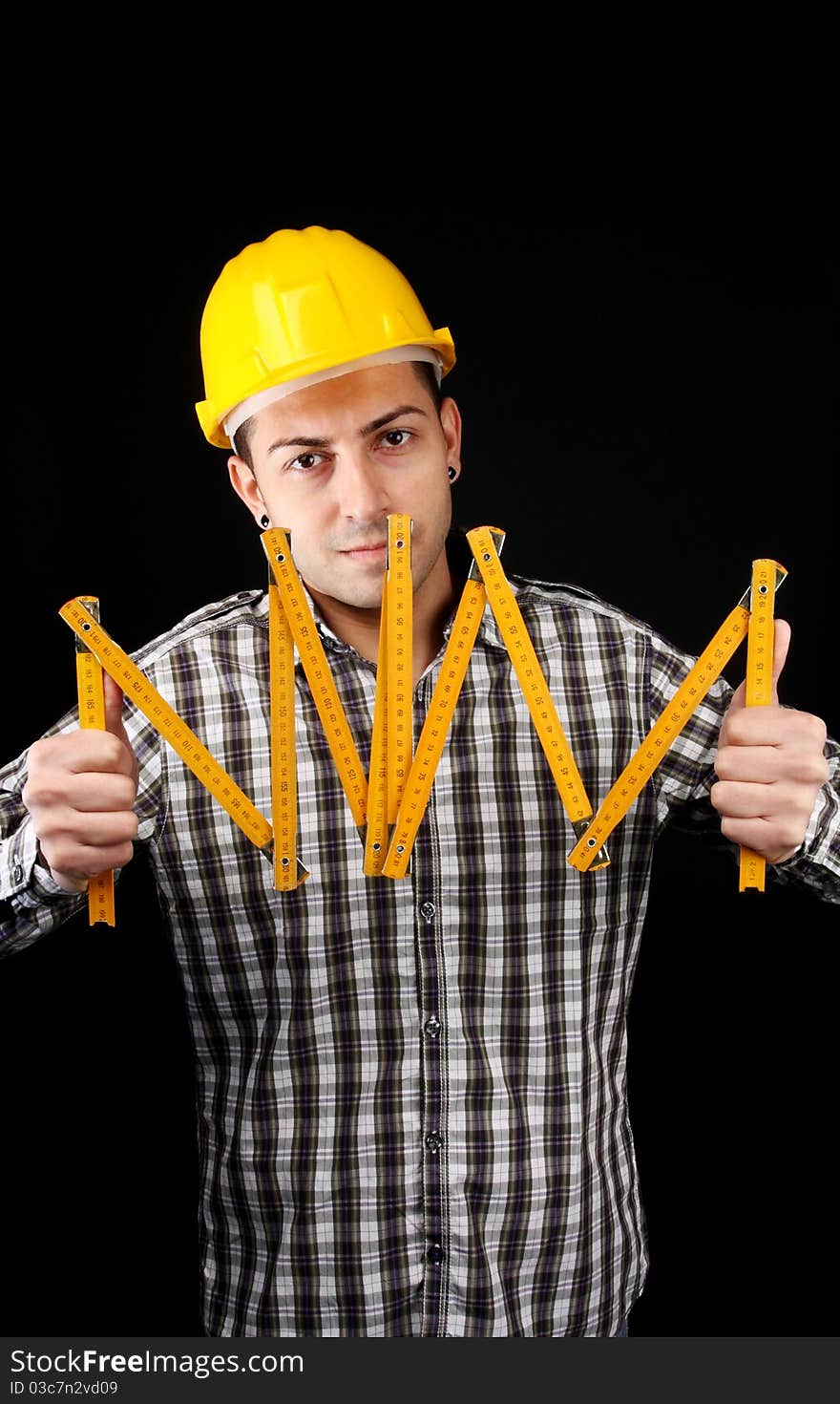 Manual worker isolated in black. Manual worker isolated in black