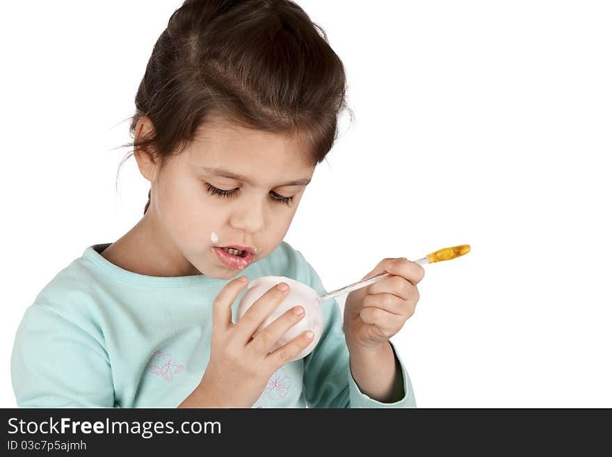 Girl eating yogurt