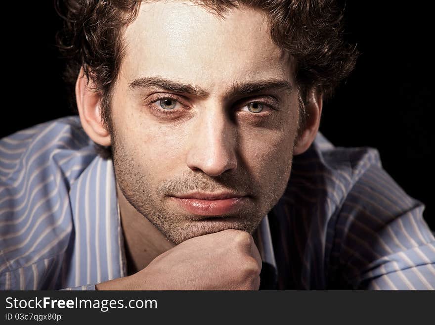 Portrait of attractive adult man on black background. Portrait of attractive adult man on black background