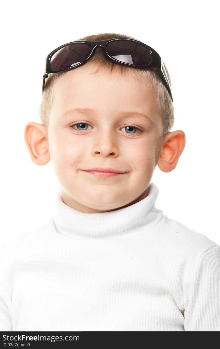 Cute little boy posing isolated on white