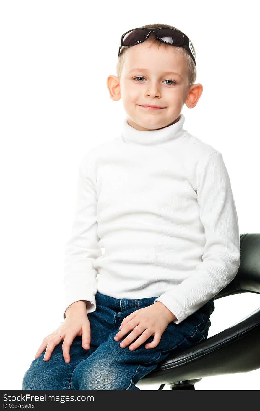 Cute little boy posing isolated on white