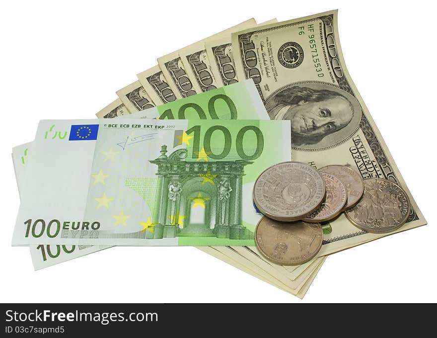 Dollars, euros and coins on a white background. Dollars, euros and coins on a white background