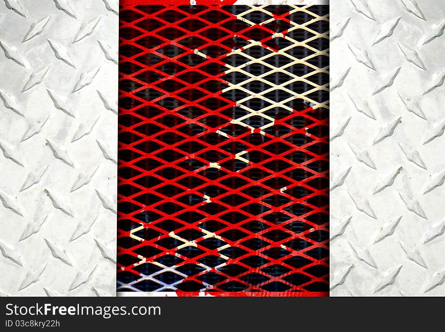 Black and white metallic mesh patterned background. Shallow depth of field. Black and white metallic mesh patterned background. Shallow depth of field