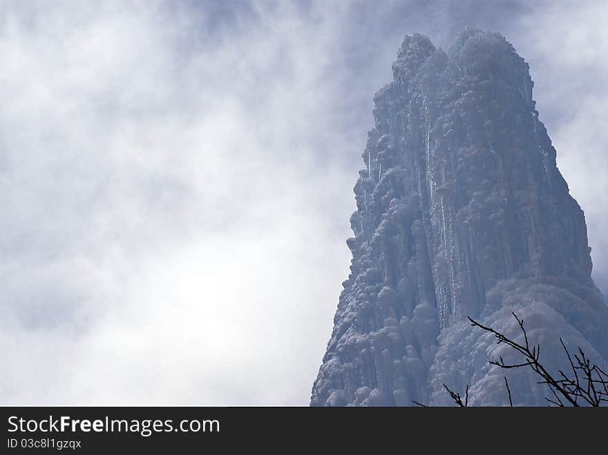 Icicles on a background of blue sunny sky. Icicles on a background of blue sunny sky.