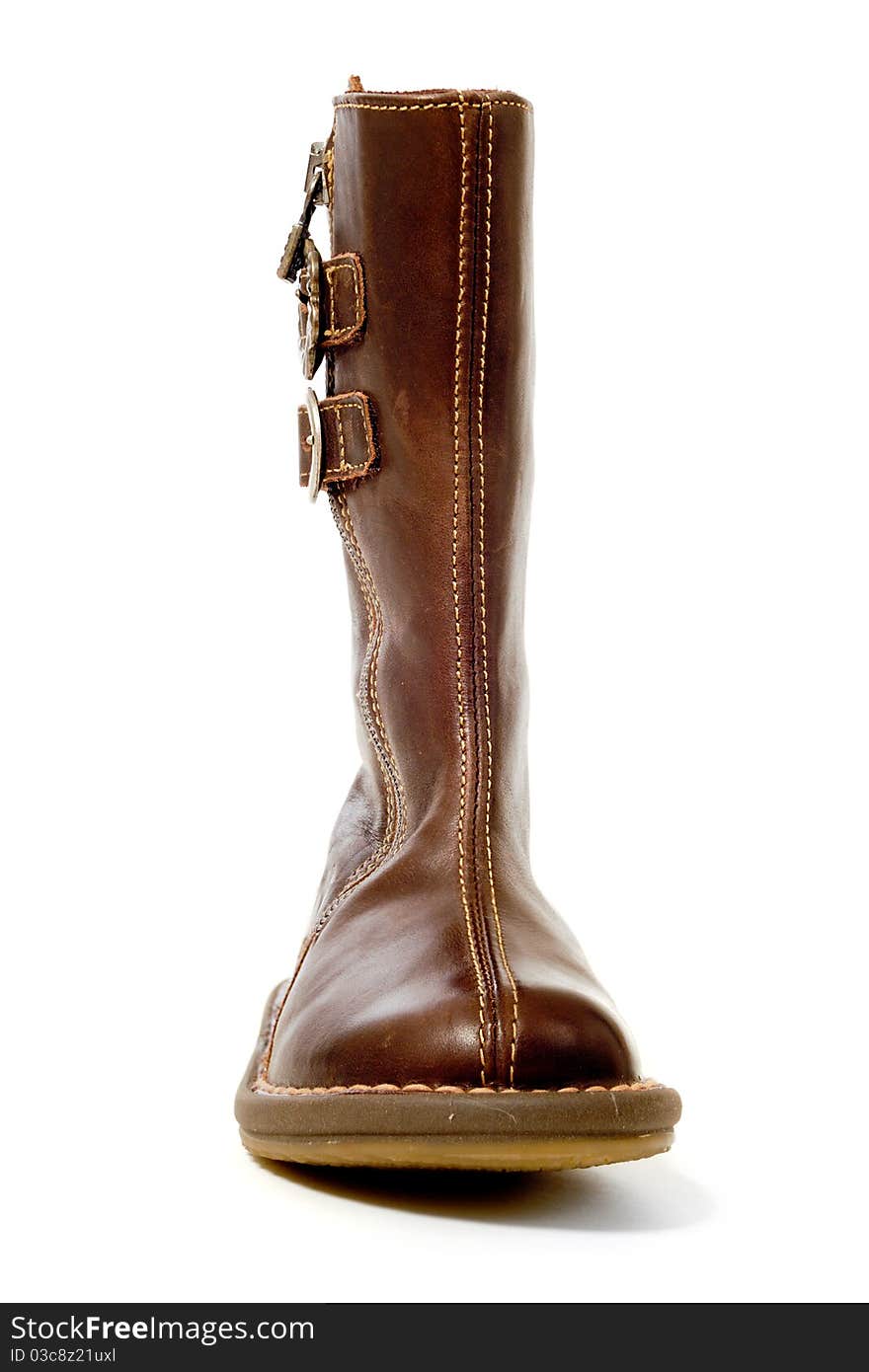 A brown high boot. Taken on a white background.