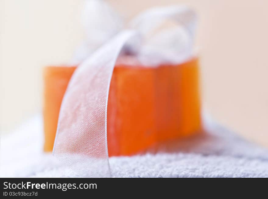 Handmade soap and towel in a spa - very shallow depth of field