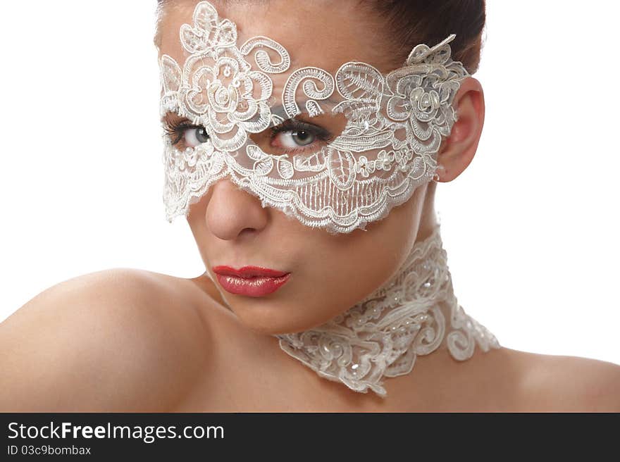 Portrait of attractive woman wearing delicate white lace on her eyes and lace necklace, sitting of elegant position in studio, on white background. Portrait of attractive woman wearing delicate white lace on her eyes and lace necklace, sitting of elegant position in studio, on white background