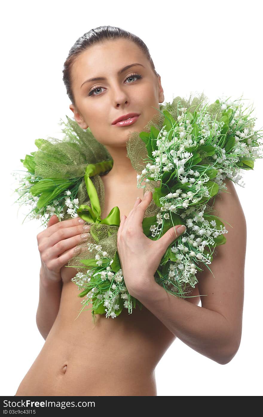 Pretty naked woman in flowers chaplet