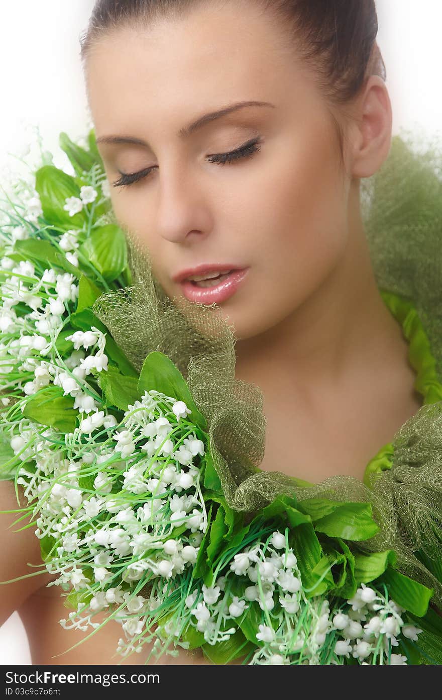 Pretty naked woman in flowers chaplet