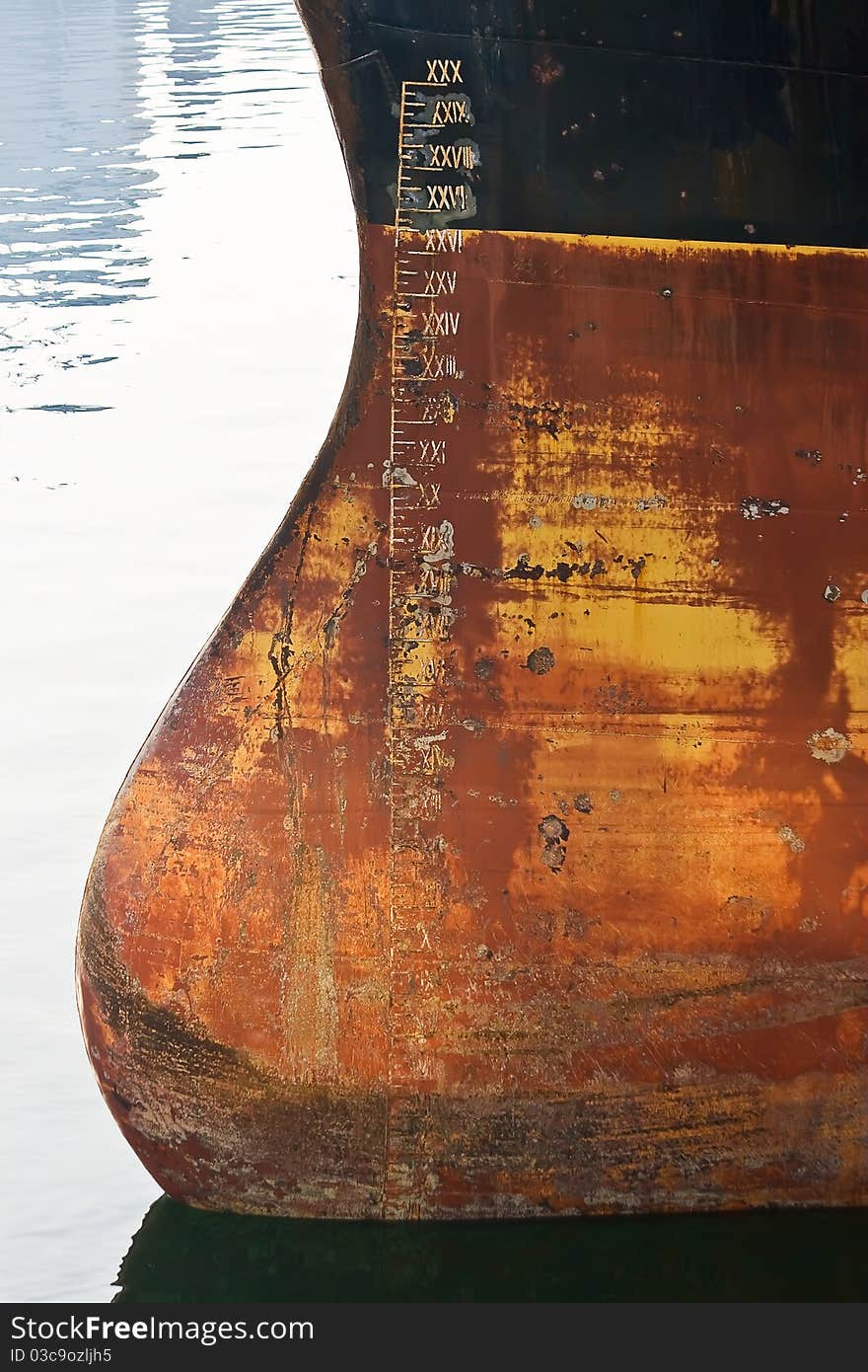 Waterline on the bow of the cargo ship.