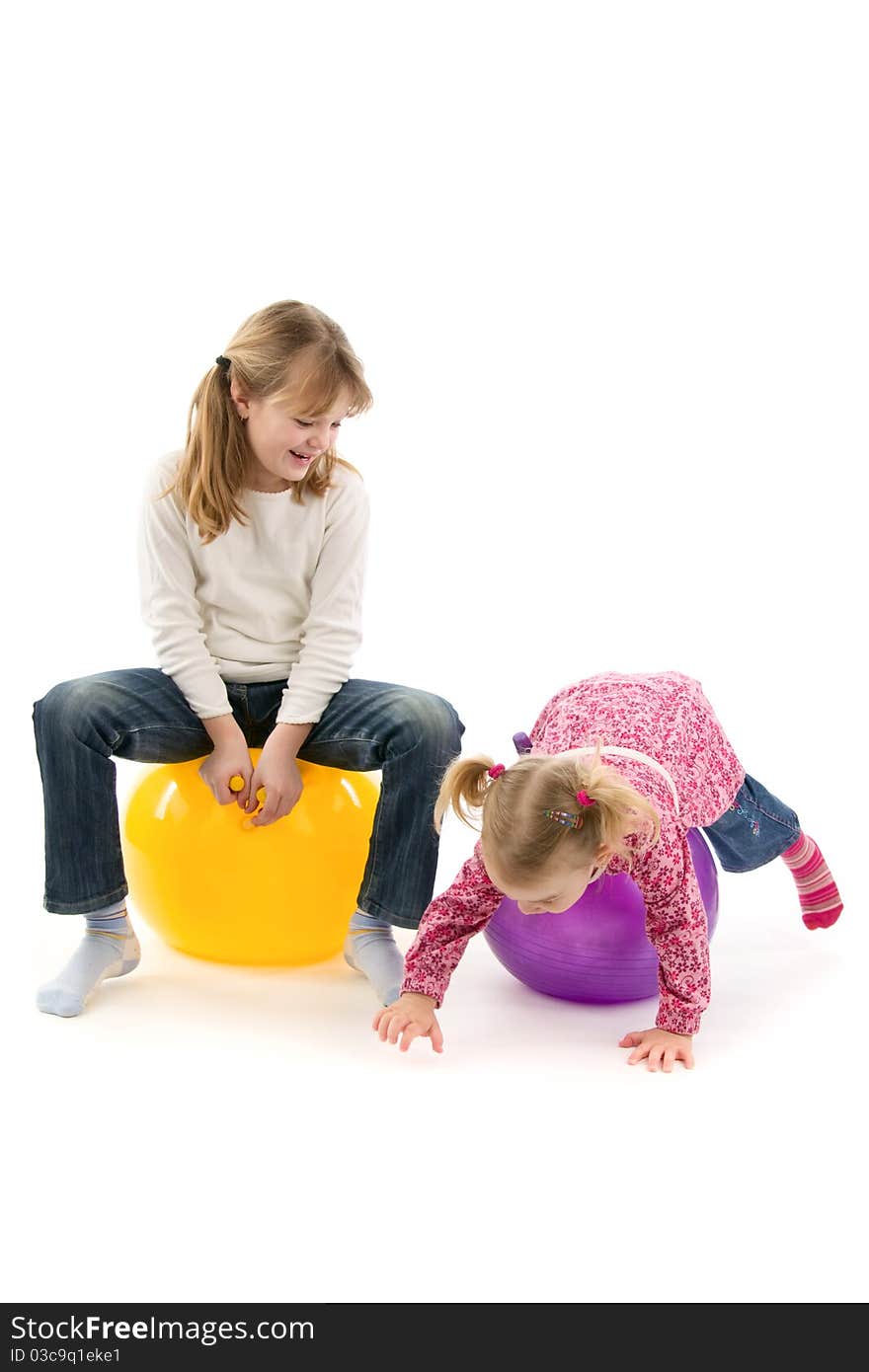 Babies with ball, on white background.