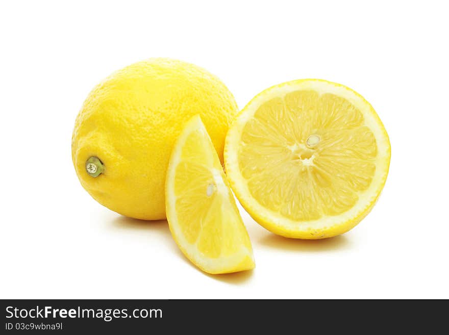 Arrangement of lemons on a white background.