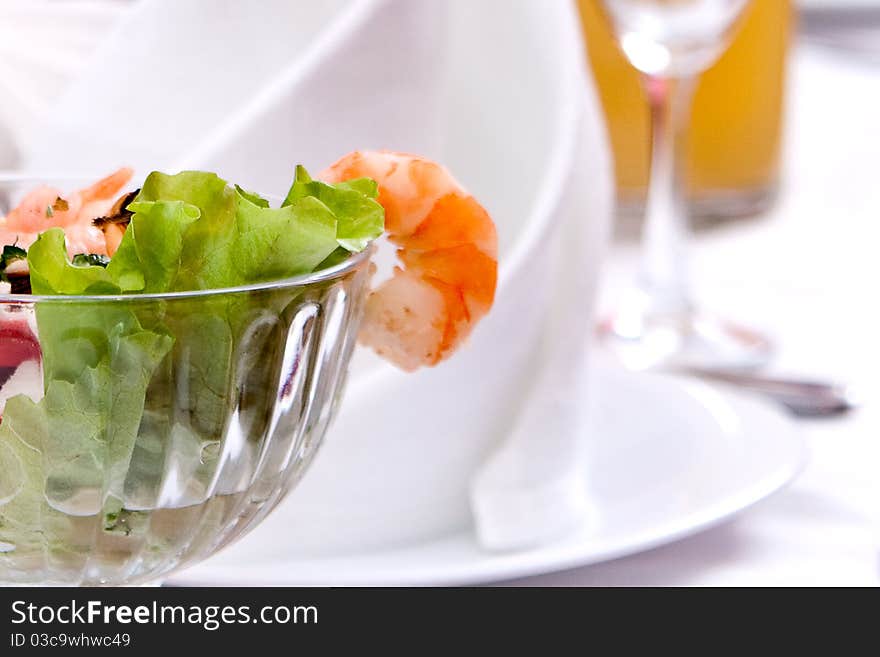 Salad with shrimps close-up