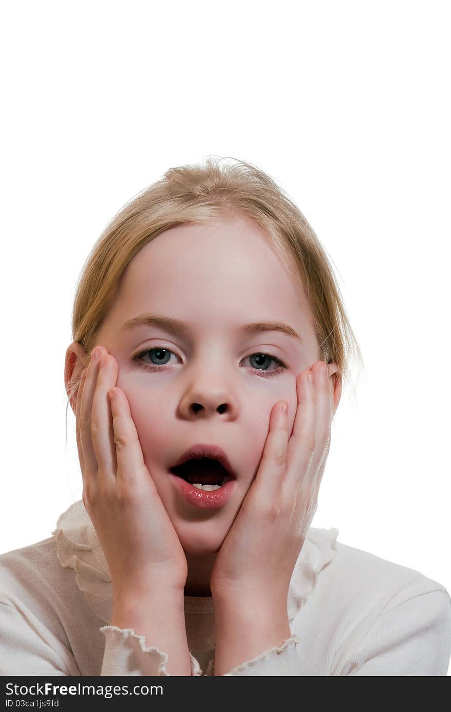 Little girl expressing amazement isolated on white background