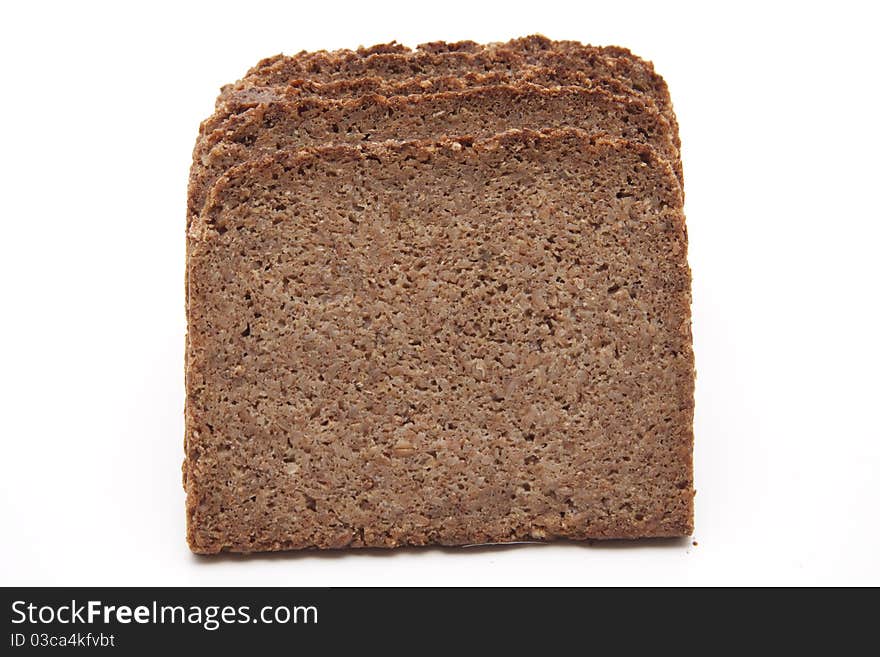 Cut wholemeal bread and onto white background