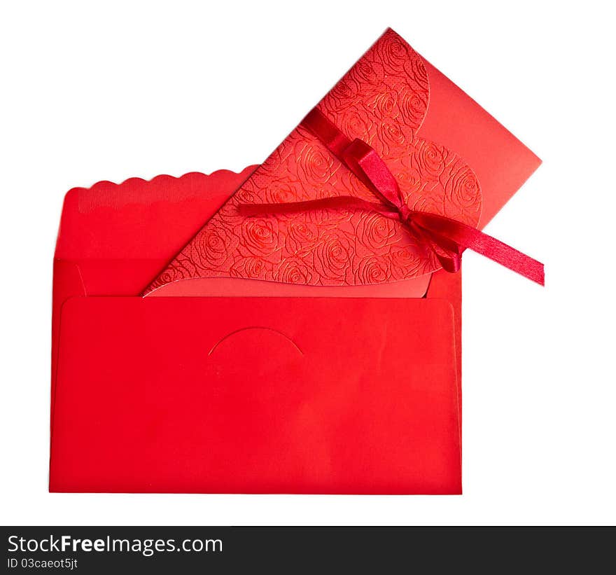 Red marriage invited and envelope with tied red ribbon. Red marriage invited and envelope with tied red ribbon.