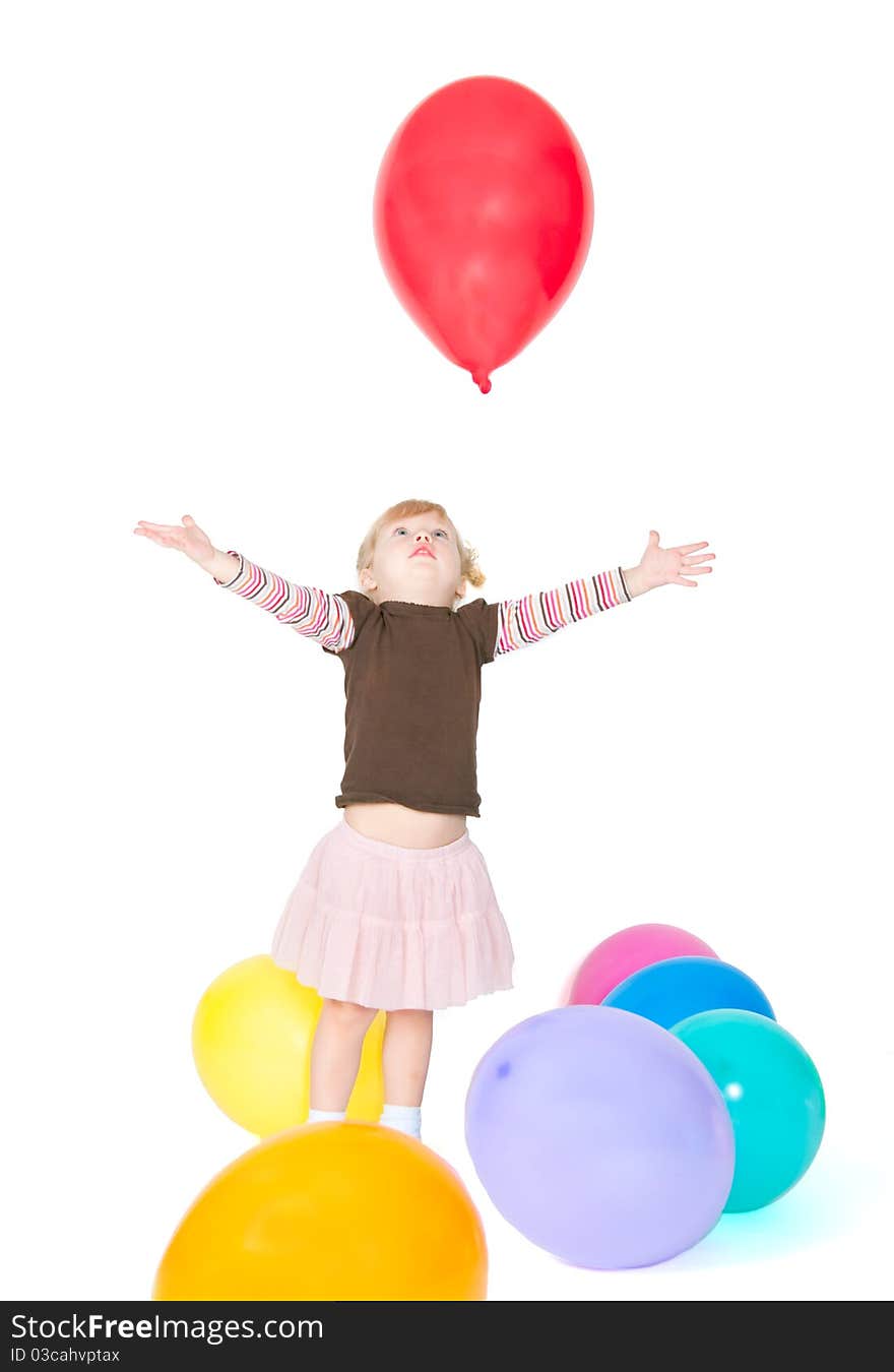 The girl catches balloon