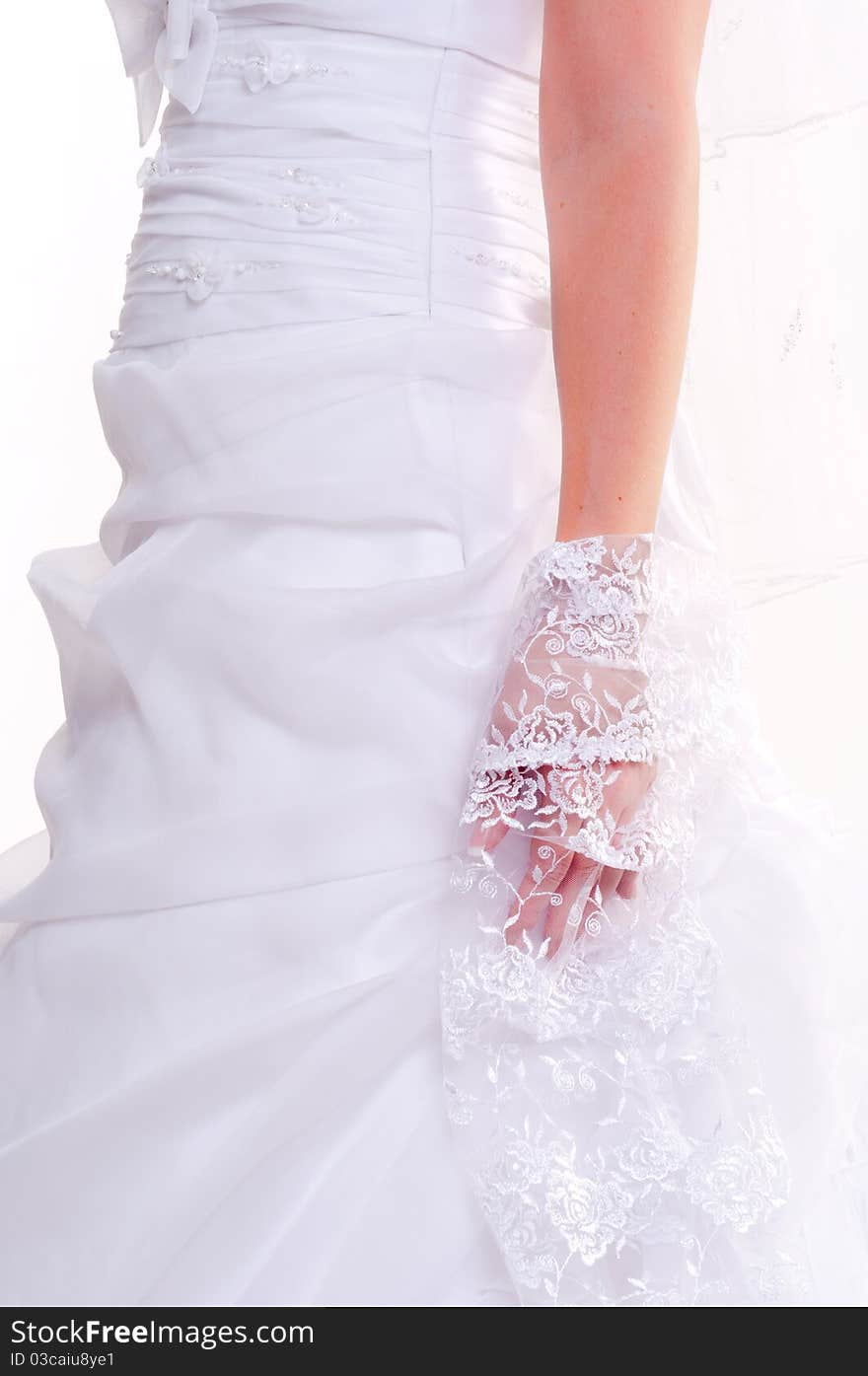 Part of a girl in beautiful wedding dress