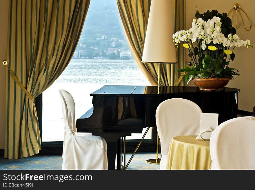 Hotel interior with piano, Italy, lake Como