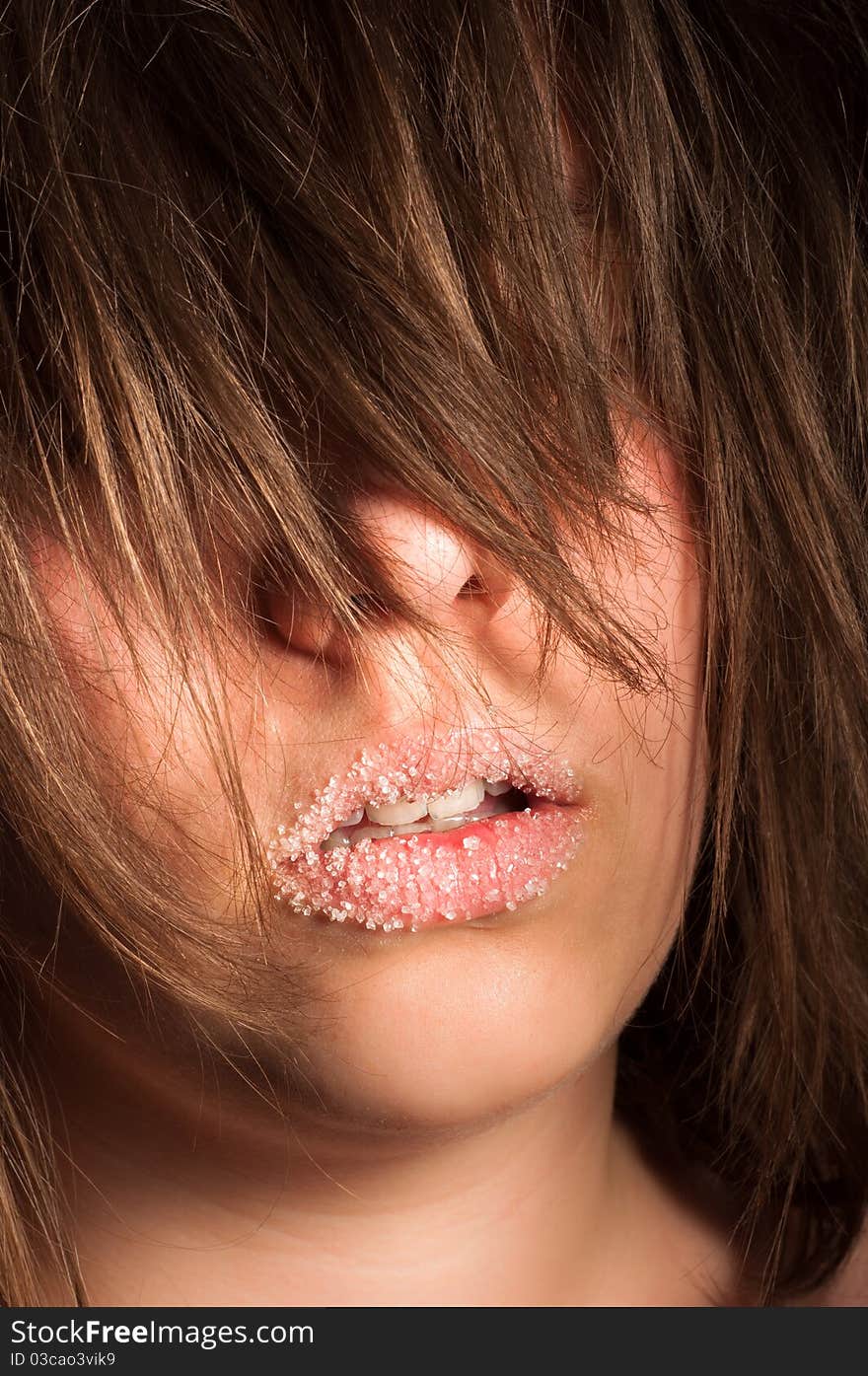 Closeup of a Girl with sugar on her lips