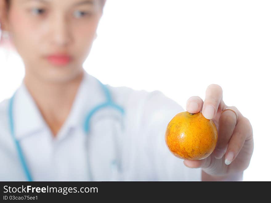 Doctoe holding orange on white background. Doctoe holding orange on white background