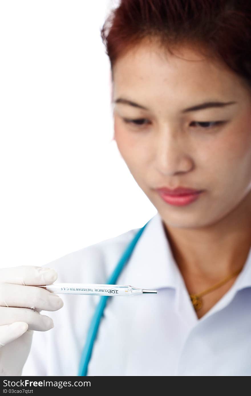 Doctor reading thermometer on white background