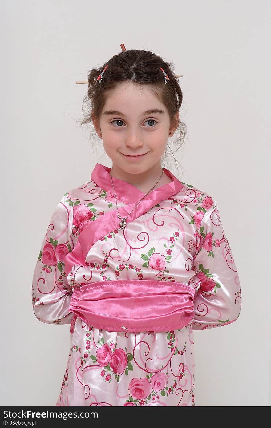 Cute smiling girl in Japanese costume