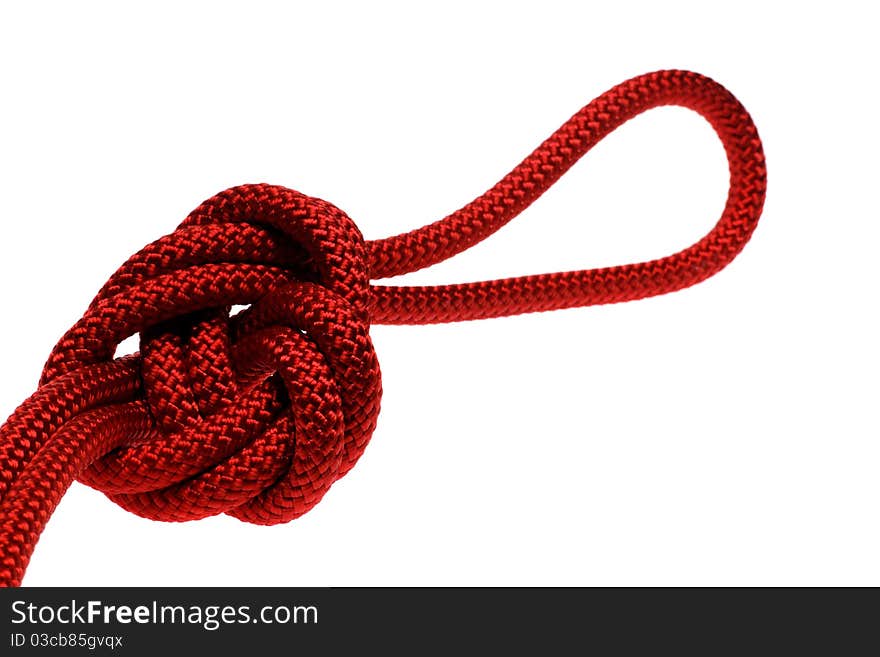 Apocryphal knot on double red rope with loop on the end. isolated on white background