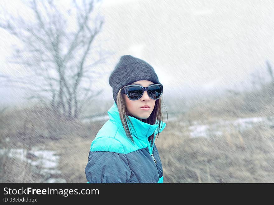 Beautiful Girl In Sunglasses And Winter