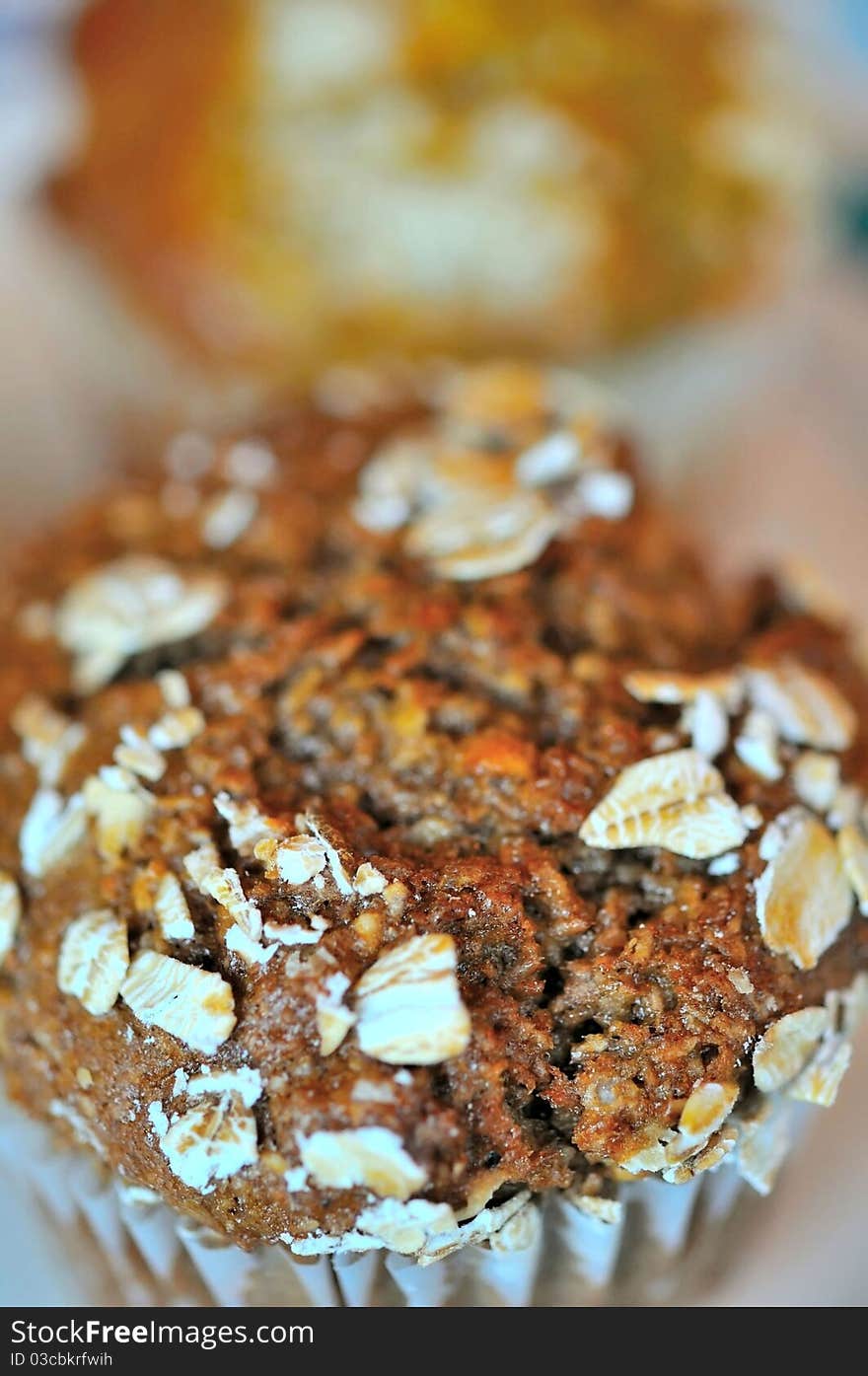 Macro shot of chocolate cupcake with oat topping.