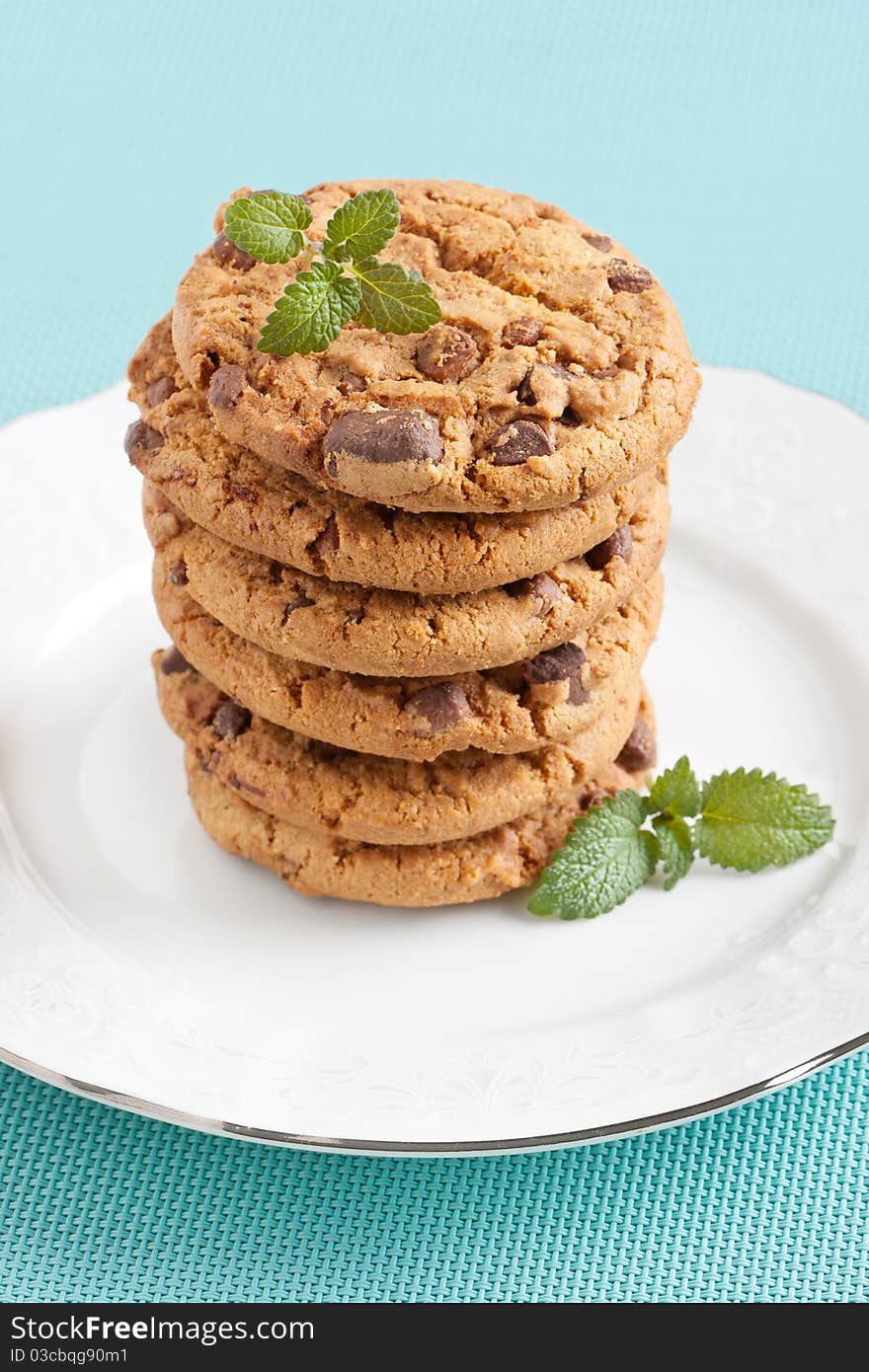 Chocolate chip cookies on white plate