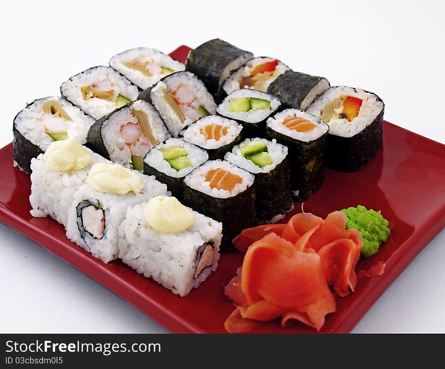 Photo of a rolled and sushi on plate