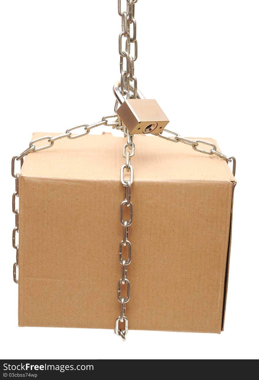 Cardboard box closed with a chain and a lock