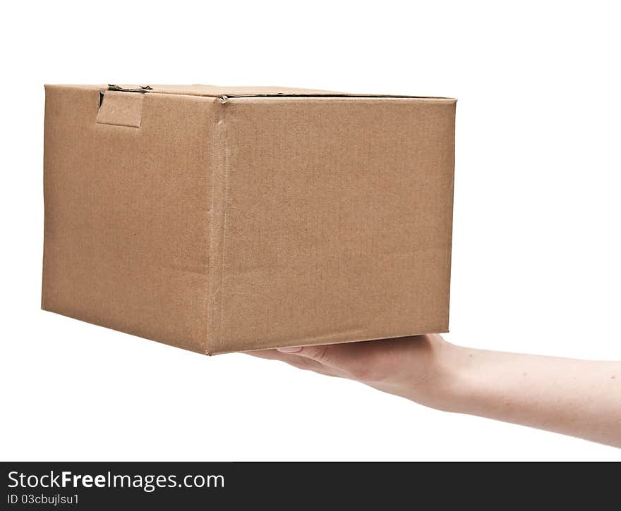 Man's hand with cardboard box on white background