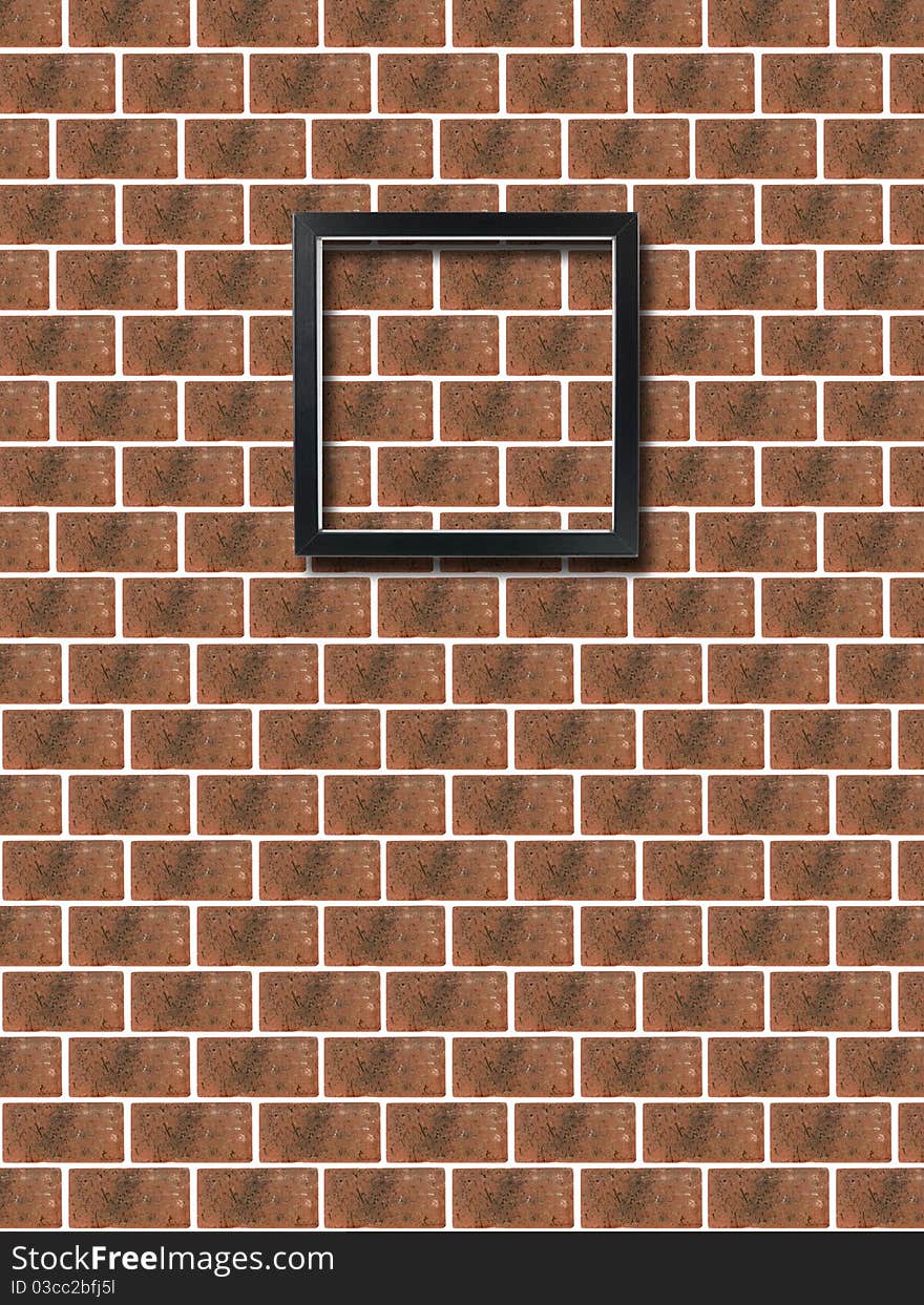 A photo frame on a red brick wall