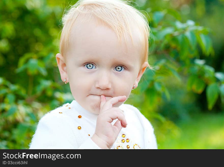 Sweet baby girl in park