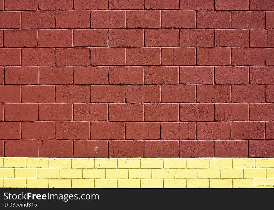 Texture brick wall. Brown top and yellow bottom